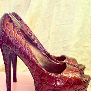 Snakeskin Platform Pumps